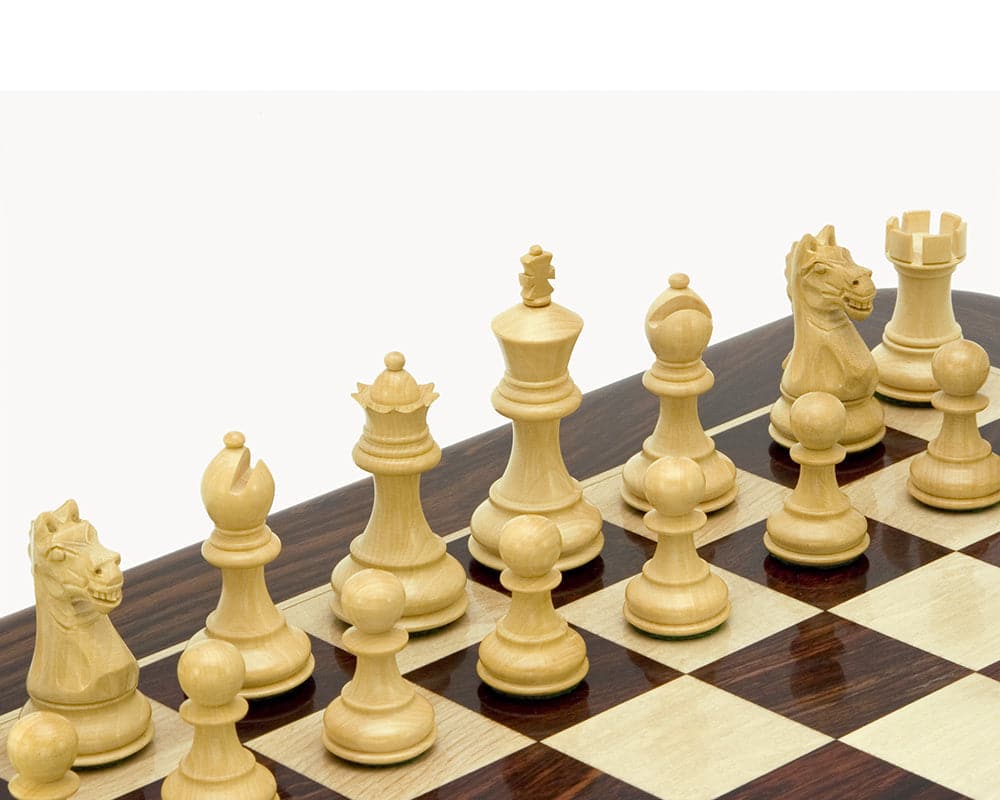 Classic Staunton design handcrafted Boxwood chess pieces on a chessboard with 3 inch King, perfect for a 16 inch board.
