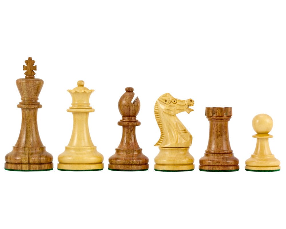 Reproduction Staunton ebony chessmen 1849 model, 4.4 inch king, handcrafted from ebony and boxwood, detailed design.