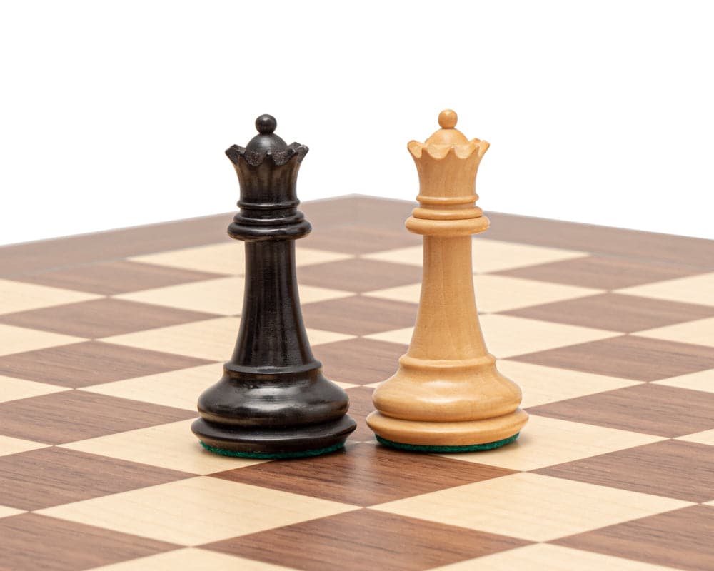 The Warwick Series 3.25 Inch Ebonised Chessmen - Black and Boxwood Chess Pieces on Chessboard.