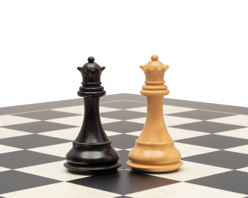 Ebonised and boxwood chess kings on a chessboard