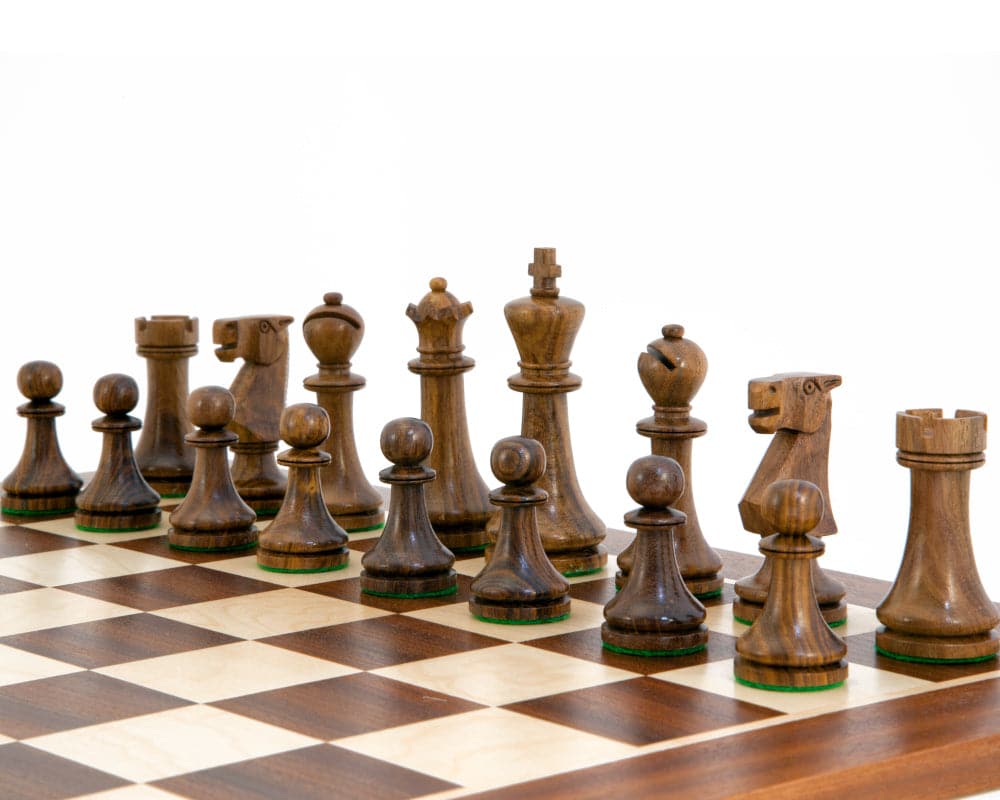 Kingsclere EO Staunton Chess Pieces 2.5 Inches on wooden chessboard, traditional Staunton design, expertly turned boxwood, weighted and felted chessmen
