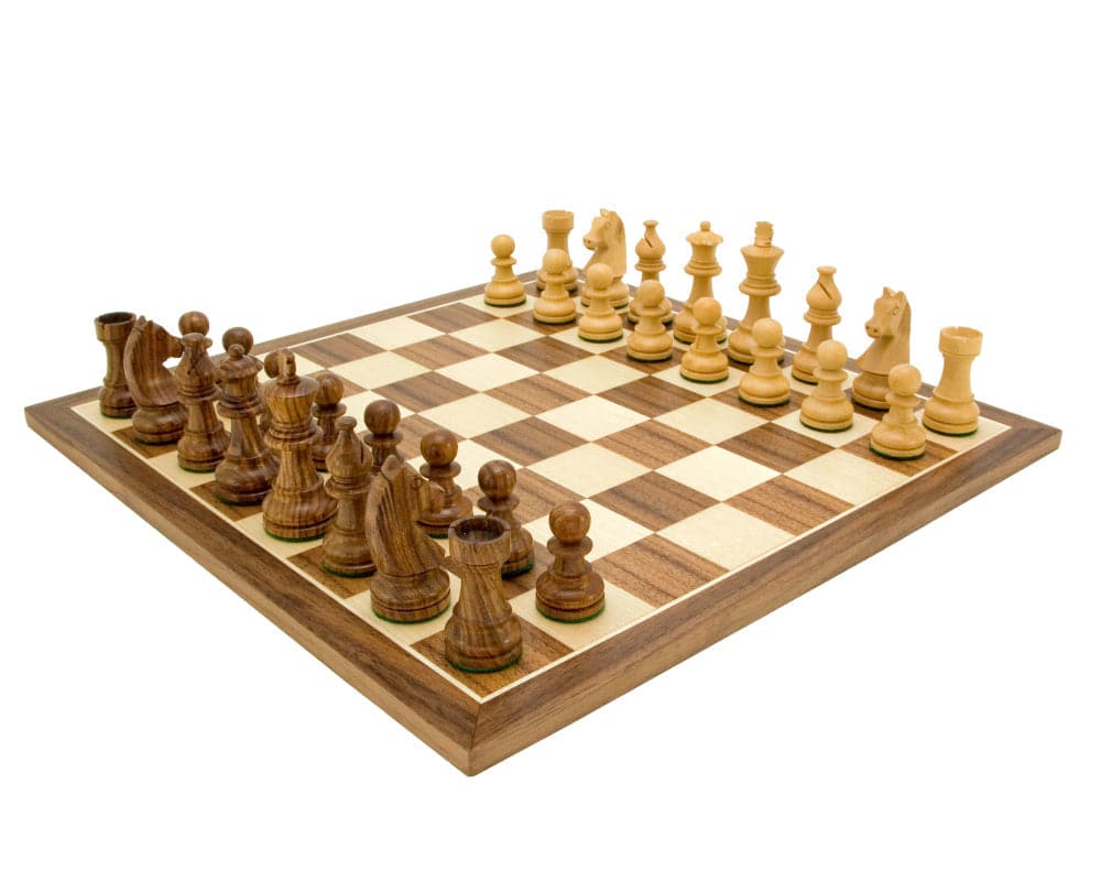 Down Head Knight Academy Medium Chess Set with Staunton chess pieces on a walnut board.