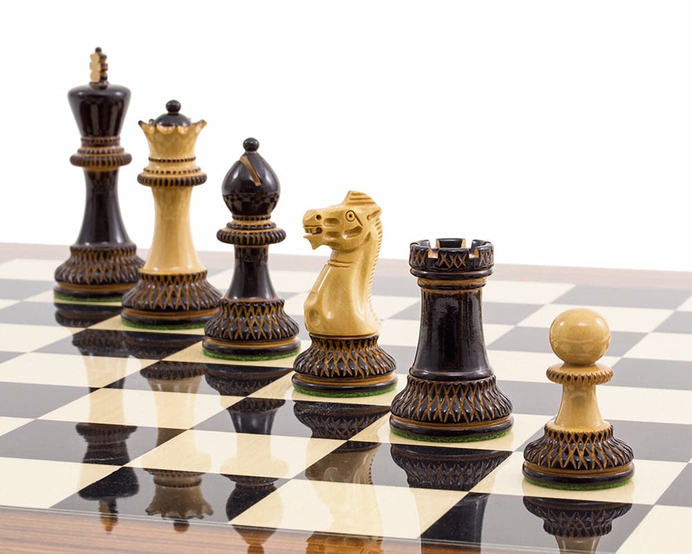 The Burnt Parker Palisander Chess Set pieces displayed on a high gloss Black Anegre and Palisander Deluxe Chess Board.