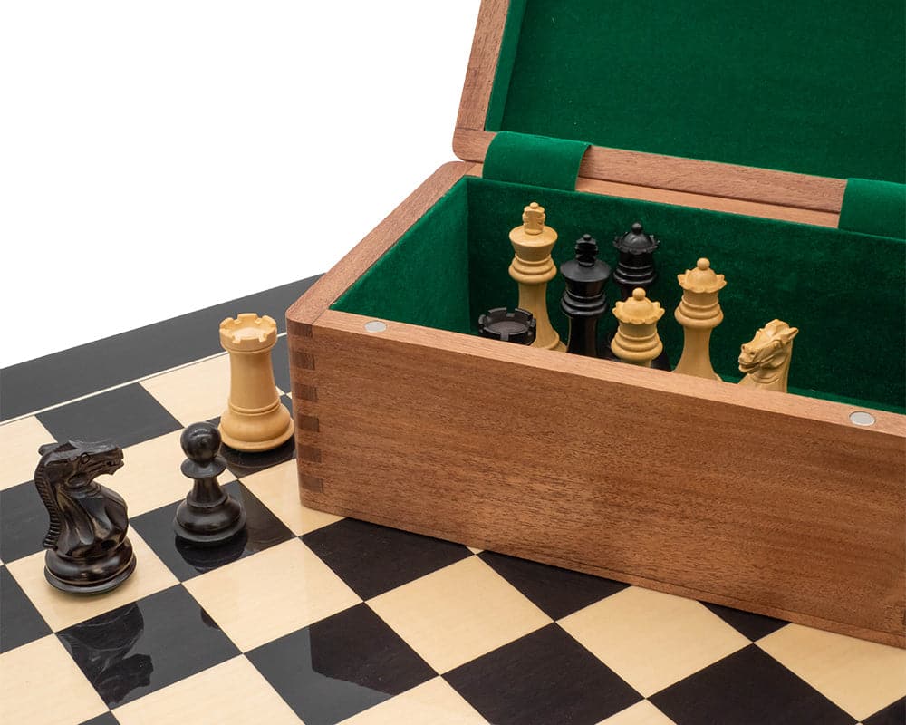 Luxury Staunton Competition Chess Set with case on a black and white chessboard.
