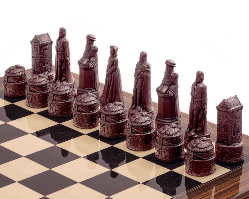 Berkeley Chess Scottish Russet Chess Men on chessboard, intricately sculpted from solid crushed stone resin with felt-covered bases.