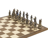 The Zombie Hand painted themed chess pieces by Italfama on a chessboard, featuring exquisite and ornate details.