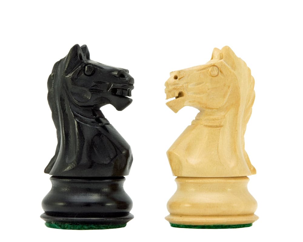 Ebonised and natural Boxwood knight chess pieces from Fierce Knight Ebonised Staunton Chessmen set.