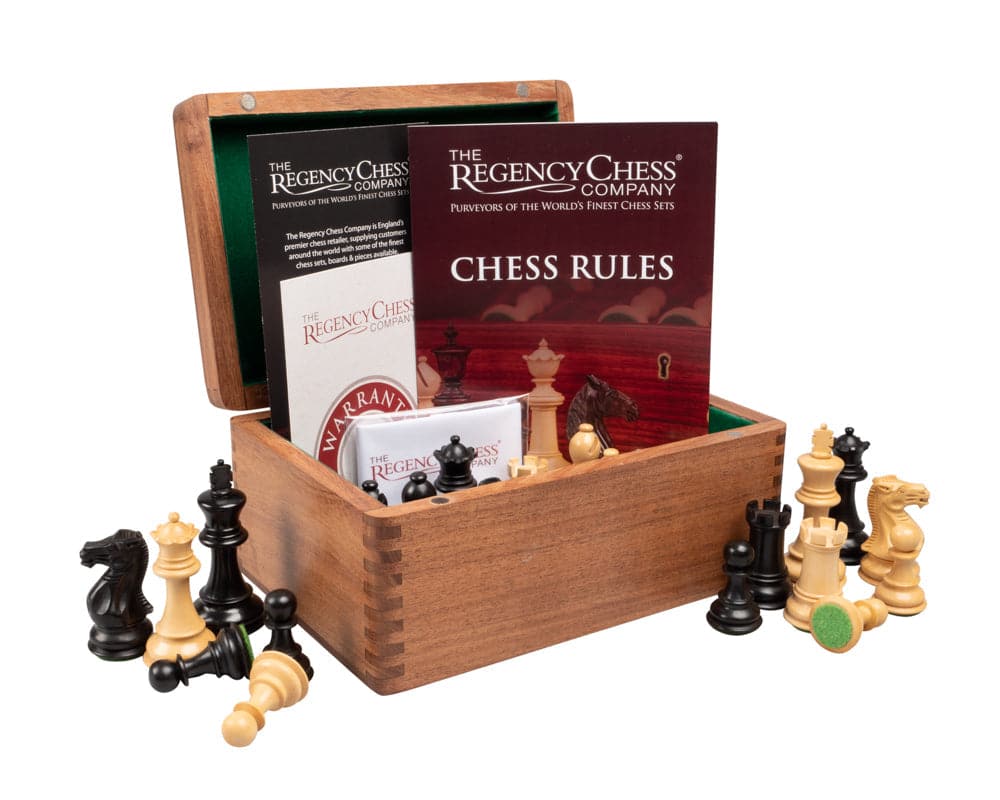 Wooden chess piece storage box with chess rules and various chess pieces displayed.