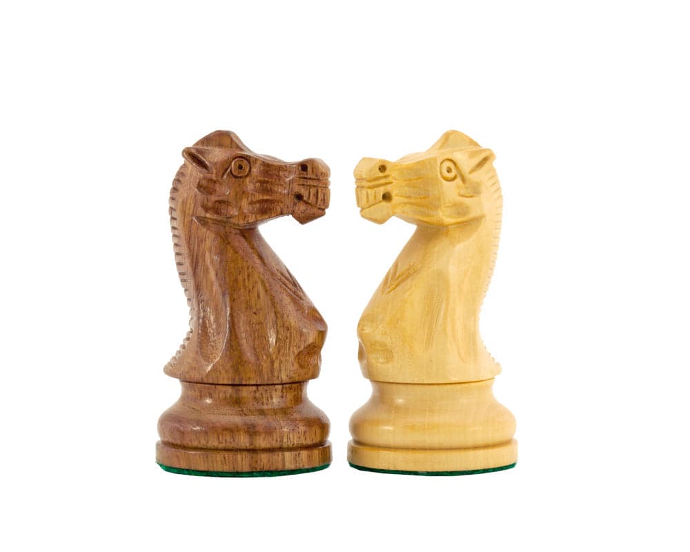 Handcrafted Rochester Ebony chess knight pieces in brown and natural wood finish.