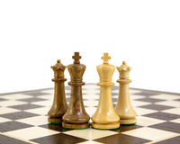 Pioneer Golden Rosewood chessmen set with 3.75-inch king and two extra queens on a chessboard.