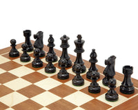 French Knight black mahogany chess set displayed on a 19-inch mahogany and maple chessboard with expertly handcrafted chessmen.