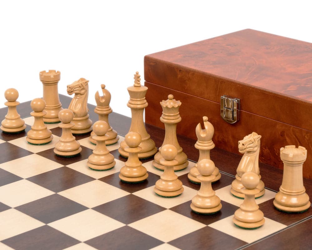 Windsor Ebony and Montgoy Palisander Chess Set with Staunton design, 3-inch king, and luxurious burl effect case displayed on chessboard.