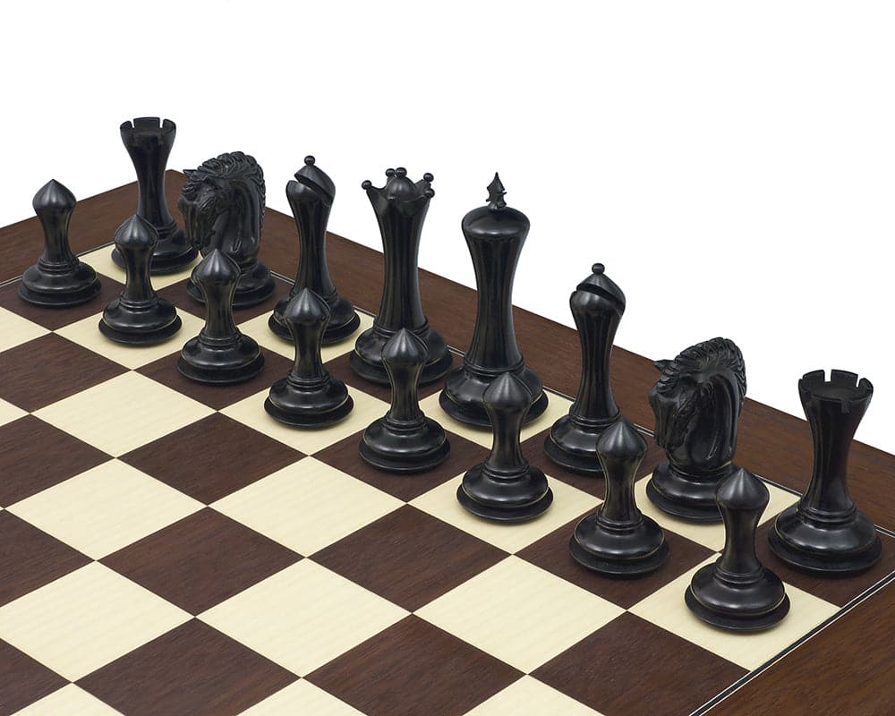 The Empire Knight Ebony Palisander Chess Set pieces on a 21.7 inch Rechapados Ferrer S.A. board, featuring an ornate Staunton design.