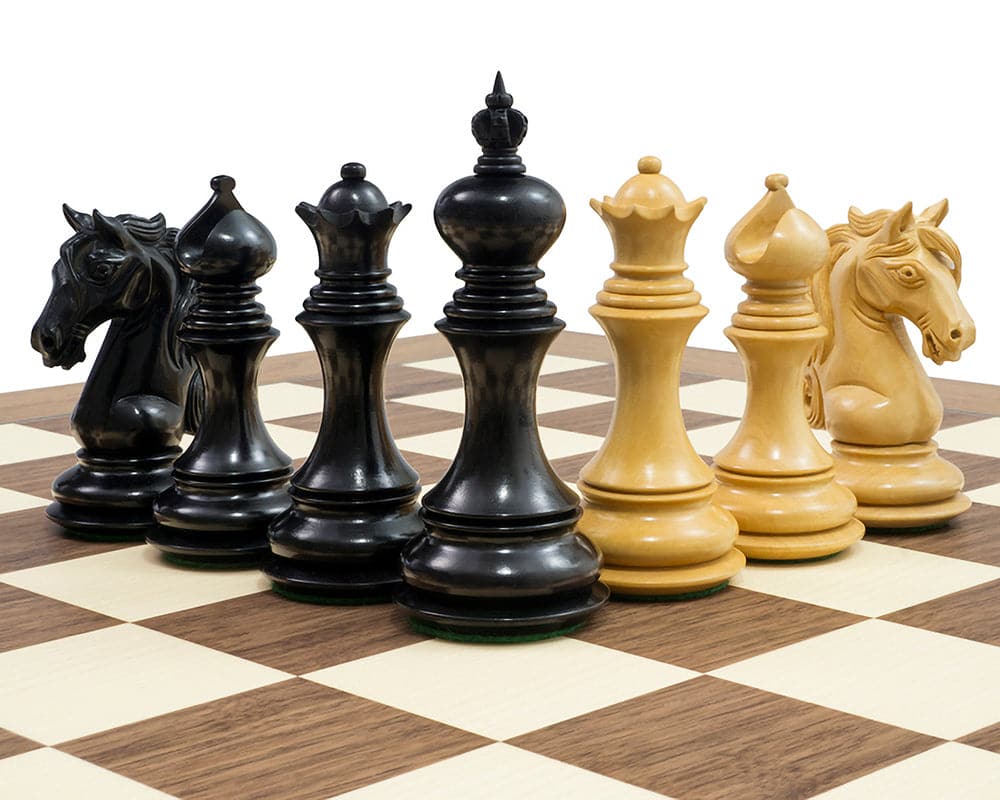 Luxury ebony and walnut chess set with handcrafted knight pieces on a superb quality walnut and maple board