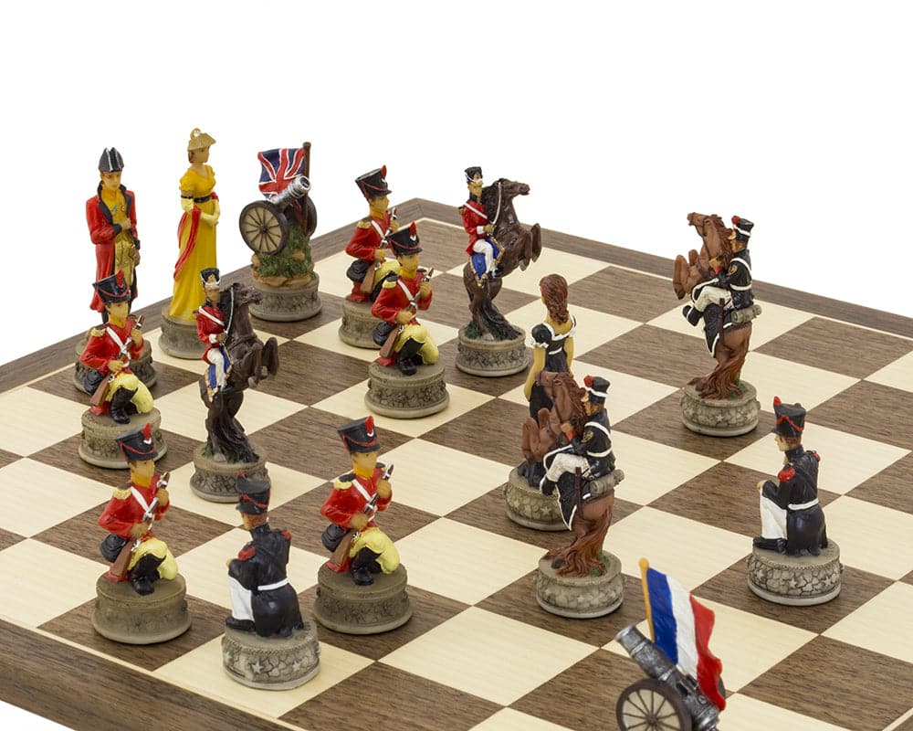 Battle of Waterloo hand painted themed chess set by Italfama with navy French and red British pieces on a beautiful Spanish board.